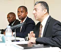 (R-L)Tito Farias the Country Director of IREX, Pascal Bizimana Rugemintwari Permanent Secretary in the Ministry of Justice and Apollinaire Mupiganyi of Transparency Rwanda yesterday. The New Times / T. Kisambira