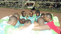 The rugby Silverbacks cuddle up before heading to the pitch. The New Times/Courtesy.