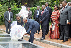 The Prime Minister of Cu00f4te d'Ivoire, Guillaume Soro, pays tribute to Genocide Victims at Kigali Memorial Centre yesterday.  The New Times / John Mbanda.