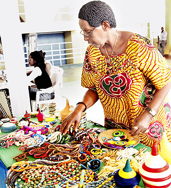 LOST FOR CHOICE A lady checks out some of the locally crafted jewellery. The New Times / E. Munyaneza