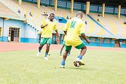 Elias Uzamukunda (L) during yesterday's training session. The AS Cannes striker scored Amavubi's equaliser on Friday and hopes to start this afternoon. The New Times / T. Kisambira