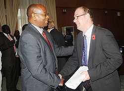 Local Government Minister Musoni and UK High Commissioner in Rwanda Benedict Llewellyn-Jones, during the JGA meeting yesterday. The New Times / John Mbanda.