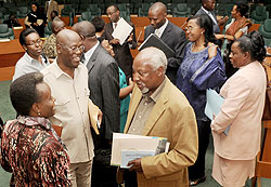 Members of the new senate share a light moment after a session. They have said they would embark on enforcement of enacted laws. The New Times / File