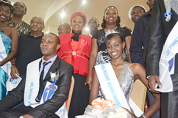 WINNERS. The newly crowned Mr Mt. Kenya University Gerald Gatete and Miss University Fadia Uwera receiving their awards. The New Times /  G. Mugoya.