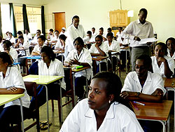 Nursing and midwifery students in an examination room. The New Times / S. Rwembeho.