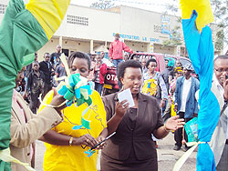 Jeanne Izabiriza, the Executive Secretary (L) opens the event, in company of the Mayor of Muhanga District Yvonne Mutakwasuku. The New Times / D. Sabiiti.