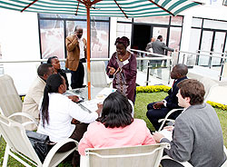 Participants in a group discussion during the meeting on NCDs. The New Times / T. Kisambira.