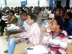 A cross section of SFB students keenly listen to proceedings during the varsity's Career Day conference yesterday. The New Times / G. Mugoya