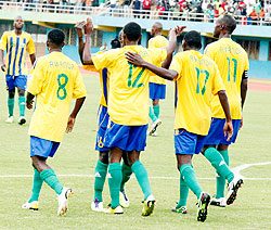 Amavubi players celebrate after scoring against Eritrea in the 2014 Fifa World Cup second leg qualifier. The New Times/T. Kisambira.