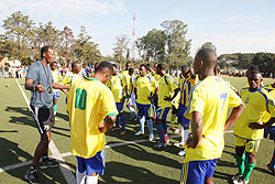 Amavubi players listening to the assistant coach Eric Nshimiyimana, during a training session.. The New Times / File.