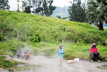 Some locals at a hot spring, in Gisenyi. The New Times / File