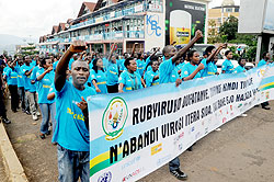 Youth walk to Amahoro National Stadium to mark the World Aids Day yesterday. The New Times / John Mbanda.