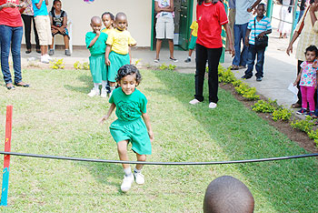A child heads for a high jump.