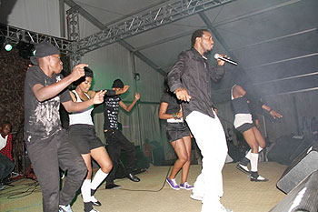 Kamichi and his dancers take on the stage during the launch of his debut album u2018Umugabirwau2019