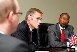  Donnal Brown addresses reporters as John Rwangombwa looks on. The New Times /T. Kisambira.