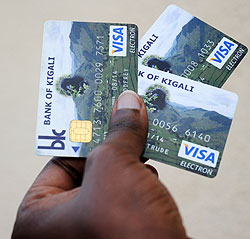 Bank of Kigali's Visa electron cards. Government aims to set in motion a cashless economy.  The New Times / J. Mbanda
