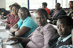 Visiting Ugandan MPs closely follow a presentation at the Ministry of Health yesterday. The New Times / John Mbanda.