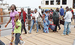 Congolese arrive in neighbouring Congo- Brazzaville. Others are in Gisenyi fearing post election unrest. Net photo.
