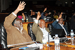 L-R; Senators Tito Rutaremara, Emmanuel Bajyana and Mike Rugema. unanimously elected J. Damascene Bizimana as the new Chairman of Amani Forum. The New Times/ J. Mbanda.