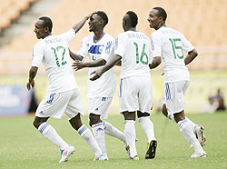 Caption-Amavubi players celebrate Olivier Karekezi's winning goal yesterday. The New Times / B. Mugabe.