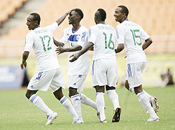 Caption-Amavubi players celebrate Olivier Karekezi's winning goal yesterday. The New Times / B. Mugabe.
