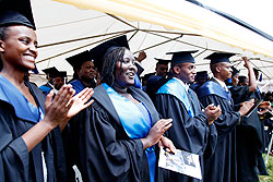 Happy moments among a cross section of SFB graduates during the varsity's graduation ceremony in Kigali yesterday. The New Times /Timothy Kisambira.