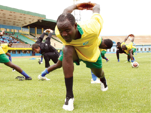 Rwanda's goal scoring machine Olivier Karekezi stretching during one of the team's training sessions. 