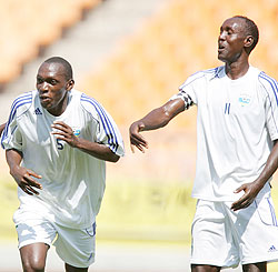 Meddi Kagere (left) celebrating his first goal with team mate Olivier Karekezi. The two Amavubi striker finished  as joint tournament top scorers. Sunday Times/ B. Mugabe