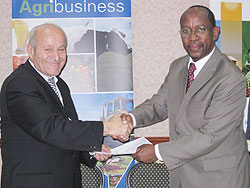 Algerian-CEVITAL-Group-representative-Issad-Rebrab-(L)-and-RDB-CEO-John-Gara-after-signing-the-MoU.-The-New-Times-Courtesy.
