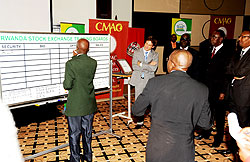 Goverment officials and other guests during the launch of Rwanda Stock Exchange. The New Times/ File.