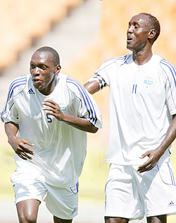 Meddi Kagere (left) celebrating his first goal with team mate Olivier Karekezi. The two strikers finished  as joint tournament top scorers. The New Times/ Bonnie Mugabe