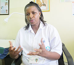 Fortunee Kamanyana, In-charge of antenatal care at King Faisal Hospital, says involving men in pregnancy and birthing is necessary. The New Times / D. Umutesi.