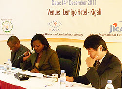 State-Minister-Emma-Francoise-Isumbingabo-addresses-participants,-JICA`s-Kobayashi-Hiroyuki-(R)-and-Aimable-Habinshuti-during-the-meeting.-The-New-Times-Grace-Mugoya