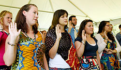 Peace Corps volunteers take the oath yesterday in Kigali. The New Times / Timothy Kisambira.