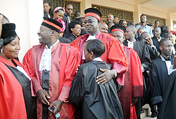 High Court president Johnston Businge congratulates the newly sworn in advocates yesterday. The New Times / J. Mbanda