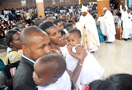 Parents who brought their Children for Baptism at St. Michael cathedral. The New Times / John Mbanda.