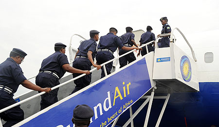 Police officers leave for a  previous peace keeping mission. A new contingent  departed for Haiti last night. The New Times / File.