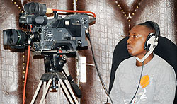 A TV cameraman captures a live discussion.Analogue will soon be phased out to pave way for digital TV transmissions.