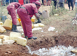 Local defence force destroy illicit brew. The New Times / File.