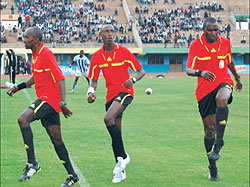 Fu00e9licien Kabanda (right) warming up with his colleagues  prior to taking charge of the league clash between Rayon Sports and Kiyovu at Amahoro stadium on Wednesday. The New Times/E. Niyonshuti.