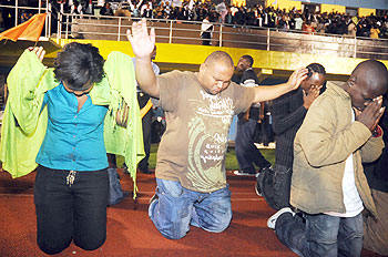Thousands of born-again Christians converged at Amahoro Stadium in Kigali and other parts of the country for overnight prayers as they ushered in the New Year.