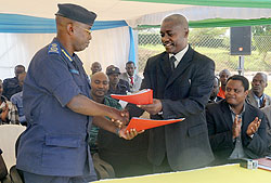 Deputy CGP Stanley Nsabimana (L) and IRST's Jean Baptiste Nduwayezu after signing the MoU yesterday. The New Times / J. Mbanda