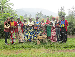 Members of Dufatanye mu Mahoro pose with their baskets after completing their English learning programme The New Times / Courtesy