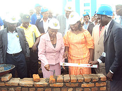 Monique Nsanzabaganwa, Deputy BNR Governor and Governor Odette Uwamariya lay a foundation stone for construction of the central bank's Rwamagana branch.
