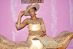 A lady poses in Muhireu2019s Inkanda design. 