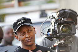 Eric Kabera behind the scenes during a film shoot.