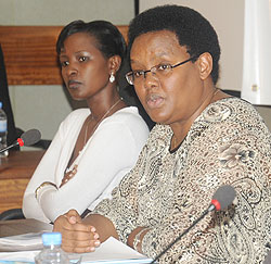 The Executive Secretary of the PSC Angelina Muganza (R) and Jacqueline Kamanzi, the in-charge of conflict management, at a town-hall meeting yesterday. The New Times / John Mbanda.