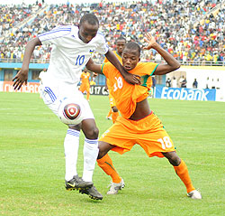 Andrew Buteera shields the ball against Ivory Coast in the Caf U-17 Championship early this year. He was one of Amavubi's top players in last year's Challenge Cup. The New Times / File