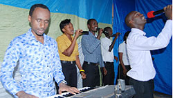Albert Ndanyuzwe (R) performs during the concert. Courtesy photo.