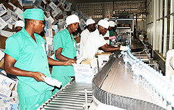 Employees at Inyange Industries pack water bottles. Water is one of the products RBS certifies with a mark of quality. The New Times / File